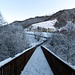 Ponte di legno sul Breggia. Si valica il confine tra Svizzera ed Italia.