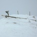 Das Gipfelkreuz des Fürstein im Winterschlaf