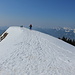 Gipfel, im Hintergrund Brauneck und Benediktenwand