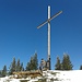 Am Gipfel mit überdimensionalen Kreuz 