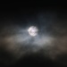Erster Kontakt 8:39 Uhr - Der Mond schob sich vor wenigen Sekunden ganz langsam von rechts her vor die Sonnenscheibe was man auf diesem Foto sehen kann. Das Foto ist durch dünne Wolken aufgenommen. Leider zog der Himmel kurz darauf vollständig zu.