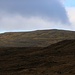 Der Fjallið (417m) im Zoom der Kamera zeigte sich noch im Sonnenschein. Wenige Minuten später wurde auch der Hügel vom Schlechtwettereinbruch eingeholt.