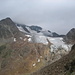 Der Rofenkarferner, links der Ötztaler Urkund 3554 m. Die Wildspitze in Wolken gehüllt