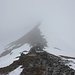 <b>Bassa della Prosa (2592 m). <br />Dato che la nebbia copre tutto il crinale sia verso il Pizzo Fortünéi sia verso il Monte Prosa decido di non andare oltre. </b>