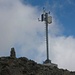Gipfelsteinmann und Wetterstation auf dem Piz Sarsura Pitschen (3134m).