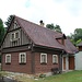 Janovice, Holzhaus