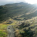 Bergweg zum Ritzengrat, oberhalb von Tufteren, in die ersten Sonnenstrahlen getaucht.