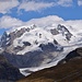 Blick hinüber zum Monte Rosa Massiv und Gornergletscher. Auch die Dufourspitze versteckt sich hinter Wattebäuschen.