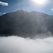 sopra le nubi in controluce la mole del monte Vago