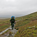 Auch der zweite Tag beginnt mit Regen. Durch das Illmandalen geht es von Rondvassbu nach Bjørnhollia.