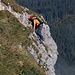 Klettersteiggänger beim Ausstieg aus der Nordwand auf der Route Le Pilier.