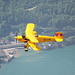 Biplane flying above Walensee