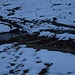 Sinnbildlich für diverse Stellen: Schneeschmelze auf Moorgebiet; oft nass und schmierig.