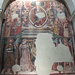 Una Madonna in maestà circondata da vari santi, sotto: la Deposizione.