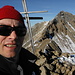 Selfie at the summit of Piz Linard, with Lenzer Horn in the background.