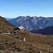 Il rifugio dell'Alpe Laghetto con i monti della Valgrande sullo sfondo