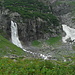 Waterfalls and snowfield during the descent.