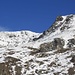 Rückblick auf den Piz Cotschen (3030,5m) beim Abstieg.