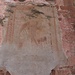 A destra del portale, affresco, ben poco leggibile, raffigurante San Cristoforo.