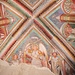Sulla volta a crociera si vede questo San Michele con la spada e la bilancia per la psicostasia ovvero la pesature dell'anima o del cuore. A sinistra un santo catafratto, potrebbe trattarsi di San Vittore, che era il santo protettore della chiesa plebana da cui dipendeva Palagnedra, o di San Maurizio. A destra Sant'Abbondio con l'abito vescovile. Nel cartiglioè segnata l'attribuzione, scomparsa nel caso del santo in armatura.