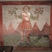 Il mese di Aprile. È rappresentato da un giovane ben vestito e con dei fiori in entrambe le mani, è il "mese cortese" del risveglio della natura e dell'amore.