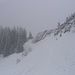 Die Querung unterhalb des Gipfelaufbaus des Heidenkopf - zwischenzeitlich starker Schneefall