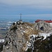 Berggasthof mit Gipfelkreuz