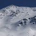 Aussicht im Zoom vom Rotgind (2290m) auf den Piz Muttala (2961m).