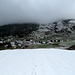 Breitbandfilm - im Streifen zwischen Schnee und Wolken sieht man den Ausgangspunkt: das frisch verschneite Bivio im Surses.