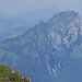 Two hikers walking up to Hinter Leistchamm, in the back Chöpfenberg and all the way in the background Rigi