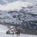 Der Skilift Cuolmen bei Bivio im Sonnenhang; Weitblick ins Bergell, wo die Sonne scheint