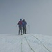 bereits auf dem Gipfel; Markus mit dem Bergführer