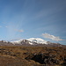 Unterwegs auf Snæfellsnes - Ausblick aus nordwestlicher Richtung (nahe Skarðsvík) zum weitläufigen Vulkan und Gletscher Snæfellsjökull.