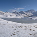 Blick über den gefrorenen Gebidum-See auf das Fletschhorn