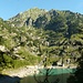 Lago di Campliccioli mit Kraftwerk und Cima di Pozzuoli