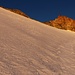 L'Evêque: Erste Sonnenstrahlen in der obersten Gipfelflanke.