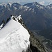 View down from the Dom summit to Saas Fee with Weissmies, Lagginhorn and Fletschhorn.