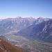 Reaching the ridge. The town of Chiavenna towered by Pizzo Stella, Cima da Lagh and Piz Gallagiun; far left, in the distance, is Piz Suretta.