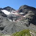 Approximate route between Lägh da la Duana and Piz Duan (F for the glacier/firn bits, T5+ and I for the rocky bits). The main difficulties are in the upper part of this photo, at the bands of rock between the disconnected mini-glaciers (at ca. 2840m and 2900m). On the upper mini-glacier, you can either head for P. 3014 (steep firn) or directly south towards P. 3088, where a short couloir provides access to easier terrain (as indicated by the upper arrow on the photo).