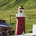 der markante Leuchtturm, im Hintergrund der Wanderweg zum Pazolastock