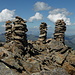 The summit of Radüner Rothorn with four cairns.