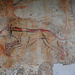 Ebenfalls ein Fresko an der Aussenwand. Man sieht den Jagdhund, der übermalte Drachen ist ca. 700 Jahre alt. In der Kapelle selbst darf nicht fotografiert werden.