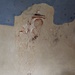 Una delle figure affrescate nell'abside, probabilmente un apostolo. 