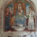La Madonna in trono fra Sant'Antonio abate e San Bernardo. Da notare il porcello nero ed irsuto, purtroppo solo parzialmente visibile,  di Sant'Antonio a sinistra nella parte alta del velario.