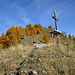 das Kreuz und das Panorama vor dem Chalet