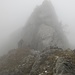 Abbandoniamo la selletta del Monte Pradè con nebbia sempre più fitta.