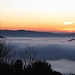 Alba.La Rocca di Angera emerge dalla nebbia(foto fatta dall'autostrada)
