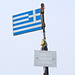 Mýtikas - Die griechische Fahne am Gipfel gibt es schon länger. Die Schrifttafel ist noch relativ neu: <br />"Let's live together in peace forever" - klingt vielleicht etwas naiv, wäre aber einen Versuch wert...