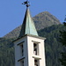 Two crosses 4km apart: on the church tower of Osco and the summit of Pécian