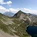 Panorama from Pécian: <br />Left Pécianett, the lakes below Laghi di Chièra and above them Pizzo del Sole; <br />Down in the Leventina you can see Faido